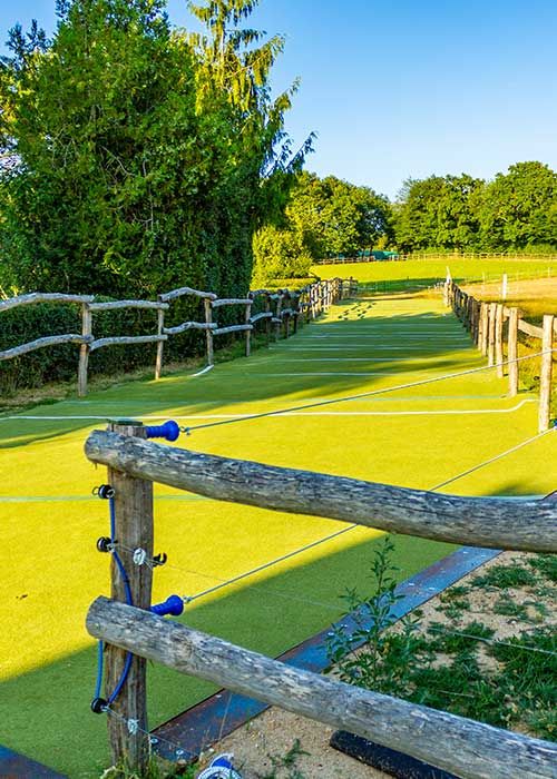 Kunstrasen weg für Pferde