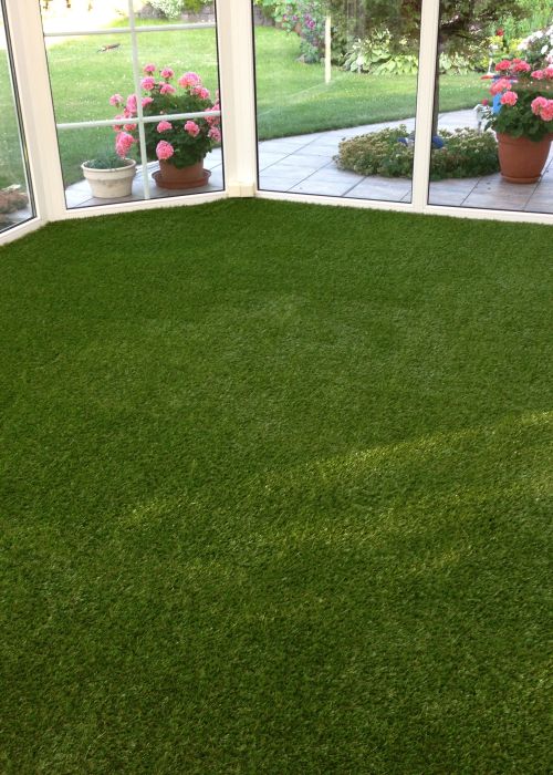 Kunstrasenboden im Wintergarten